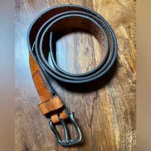 Brown leather belt with silver hardware